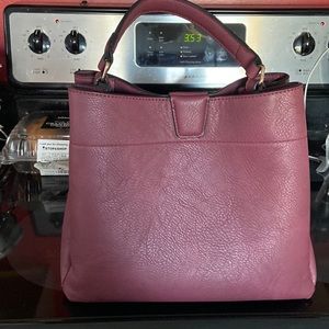 Purse. Brand new. Comes with long shoulder strap as well